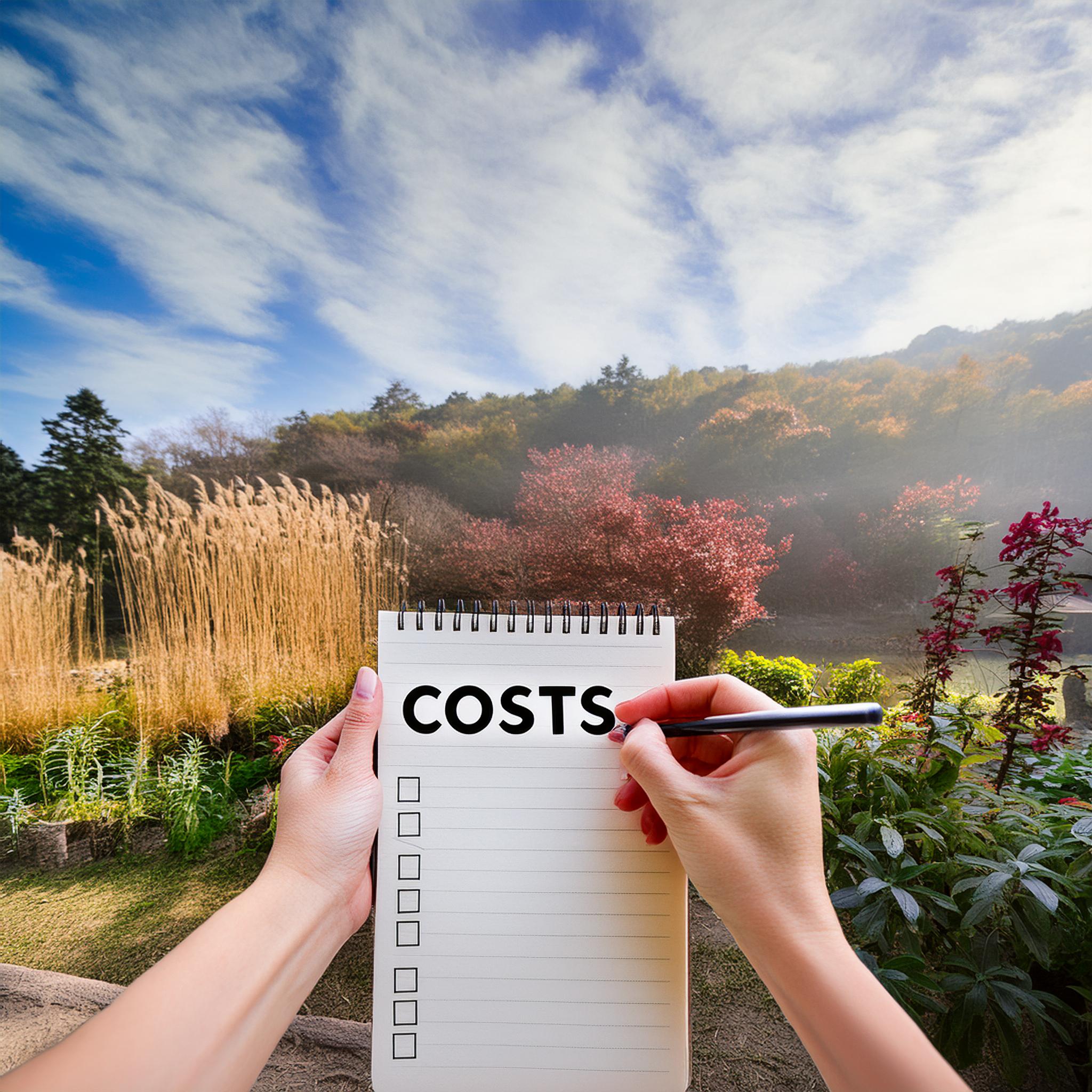 Calculating costs of a garden makeover on a note pad