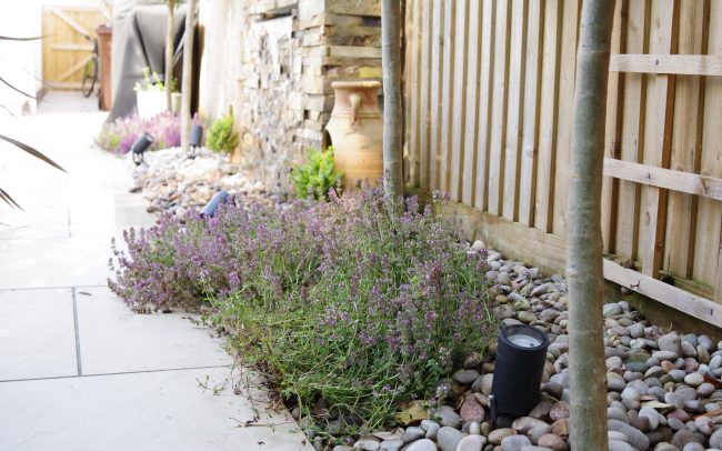 Waterfall feature in a garden in Sussex.